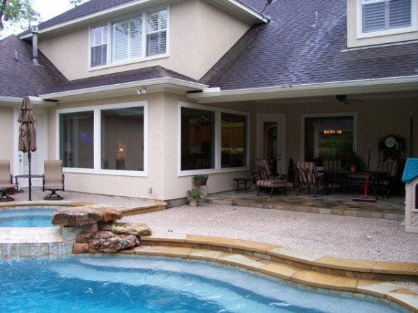 Large film-covered windows facing the pool protect your eyes