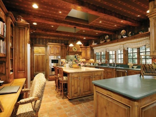 Glare from backyard lawn will not bother you when preparing meals in this kitchen