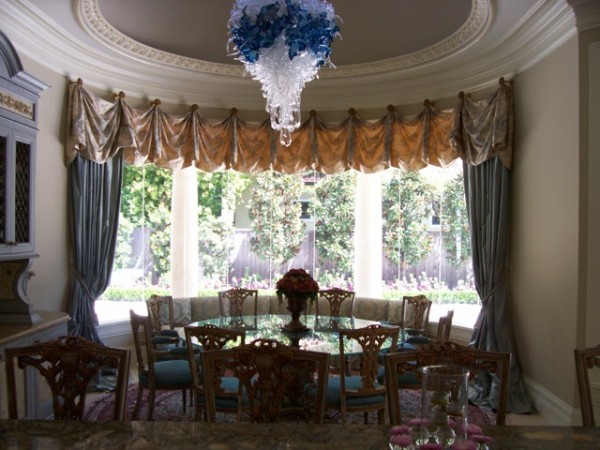 Formal dining area with film-protected curved glass