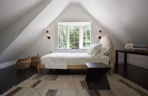 Use scone lighting to save up on leg room in compact bedrooms
