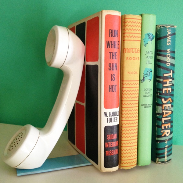 White vintage phone bookend