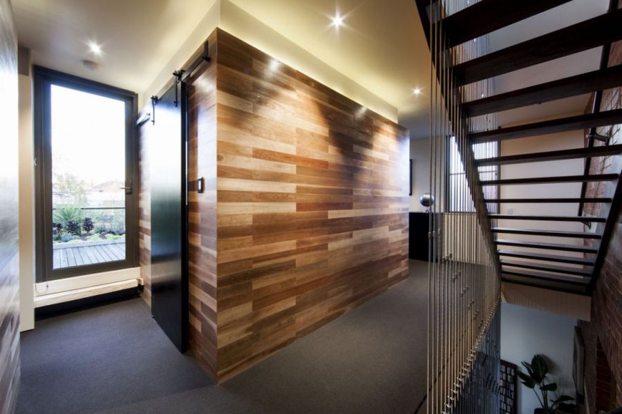 Wood covered walls of the warehouse home