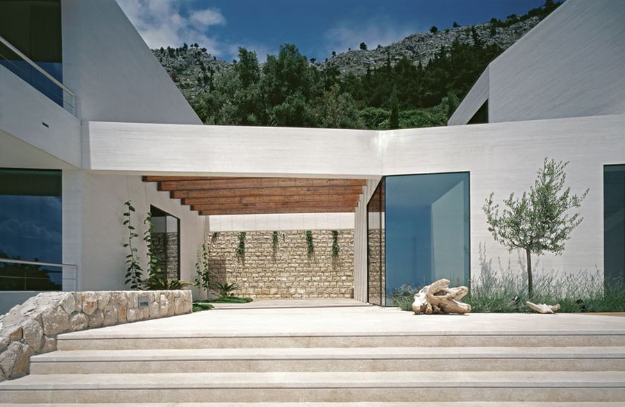 Wooden pergola between the two units of House U