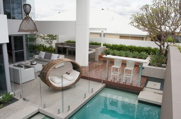 Woven daybed clearly steals the show in this patio