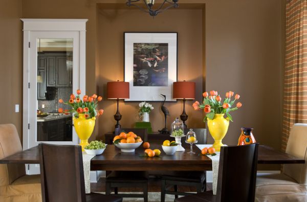 Yellow and orange added to the dining room with plenty of natural flair