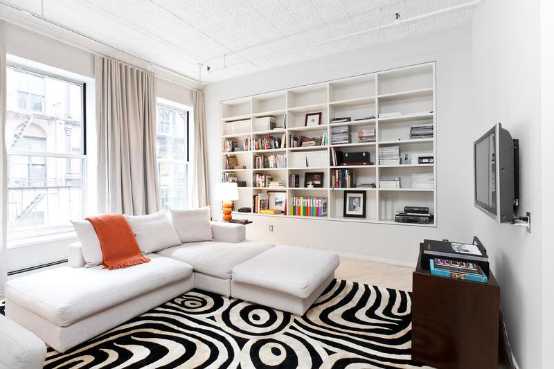 tribal rug in white painted apartment