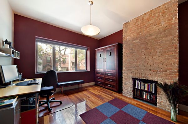 A simple bench next to the window takes over during the day