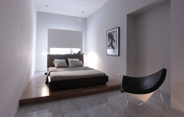 Beautiful minimalist bedroom with the coconut chair