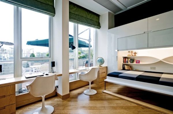 Beautiful shelves and lighting accentuate the appeal of the Murphy bed unit