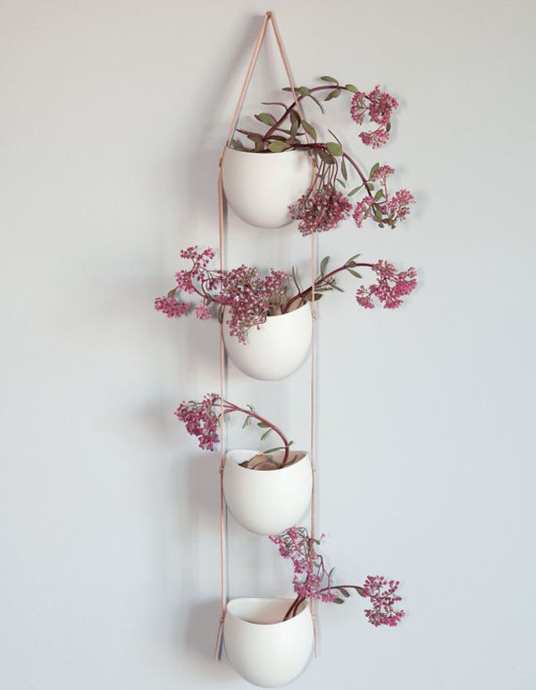 Beautiful tiered white and leather plant holders