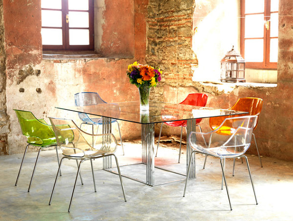 Bright plastic chairs in a converted warehouse