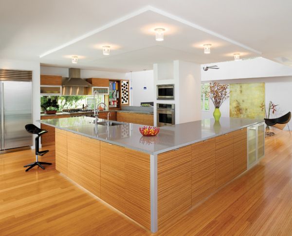 Lovely geometric variation in a sleek kitchen brought in by the Coconut Chair