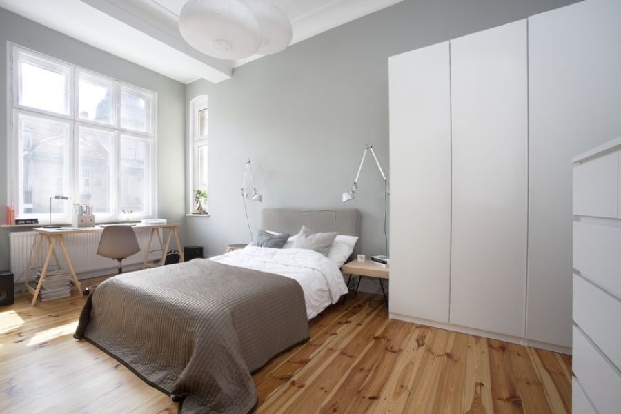 Contemporary minimalist bedroom in white