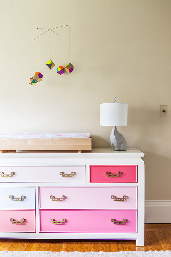 Eclectic nursery with ombre dresser