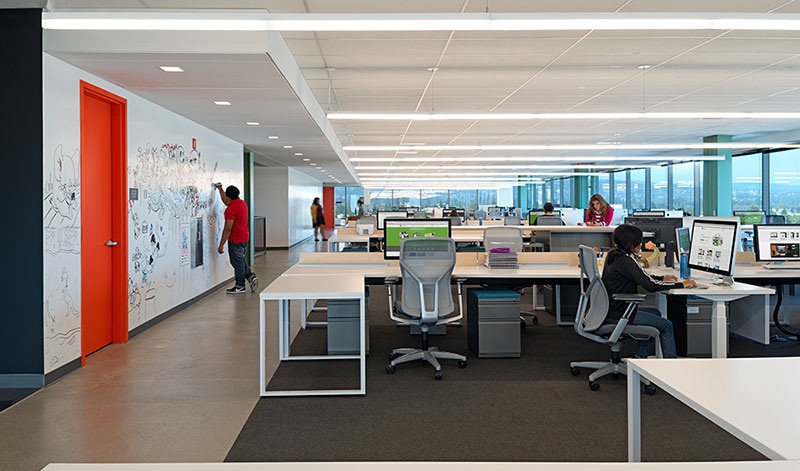 Open office work areas highlight minimalism and economy