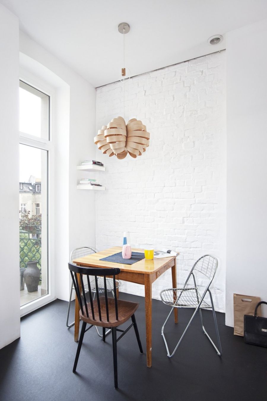 Exposed brick wall and interesting pendant lighting