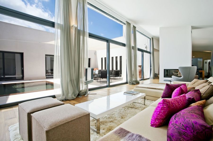 Floor-to-ceiling glass windows in the living room