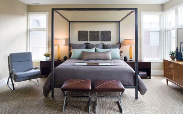 Gray bedroom with four poster bed exudes a distinctly masculine style!