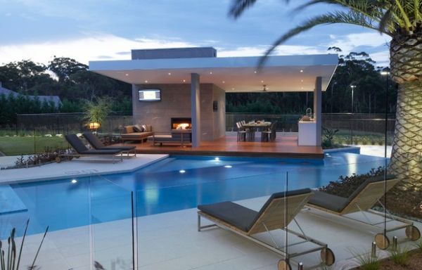 Large dining space next to the pool and the fireplace