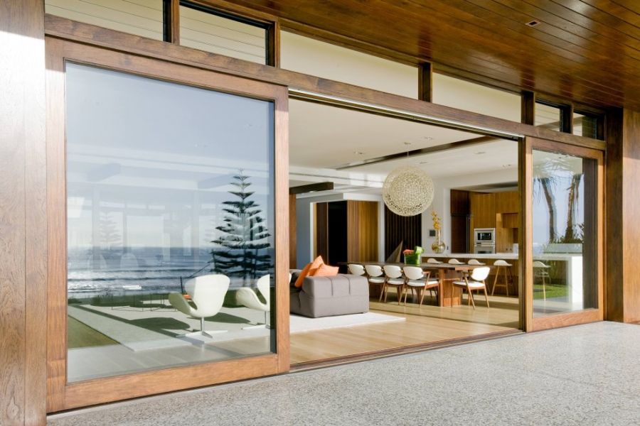 Large sliding glass doors with wooden frame