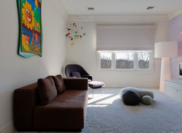 Lovely kids' room with Saarinen's Womb Chair and smartly placed felted wool stones