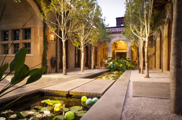 Mediterranean styled koi pond garden looks stunning