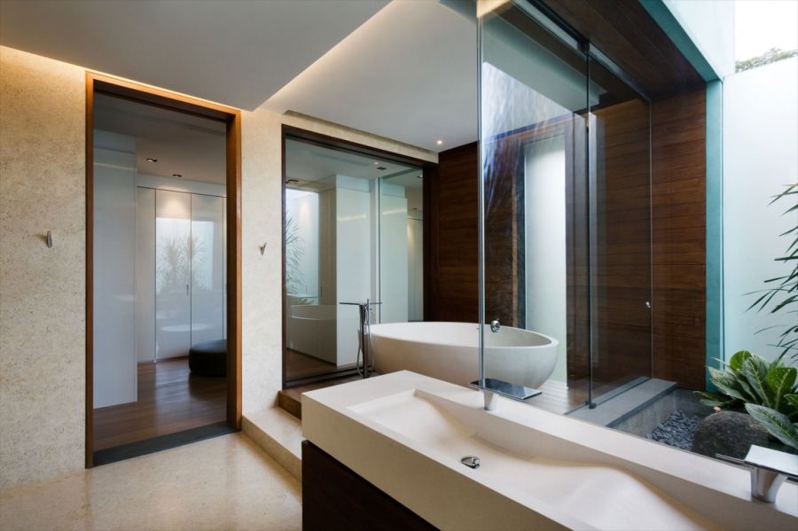 Modern bathroom in stone and glass