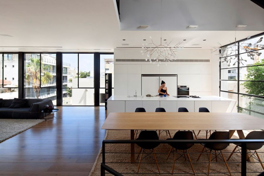 Modern kitchen and dining area in the Tel Aviv Home