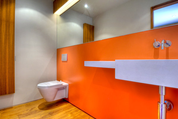 Neon orange bathroom wall