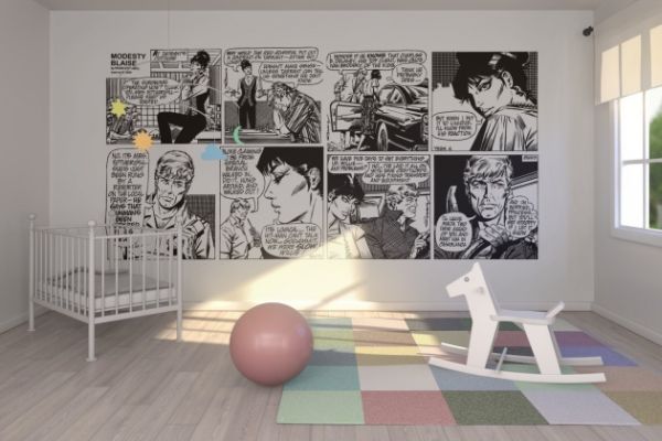 Nursery room with bold comic strip wall mural in black and white