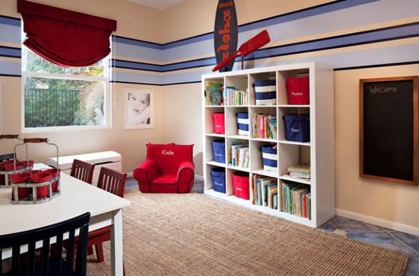 Organized kids' playroom with surfboard decor addition to the wall