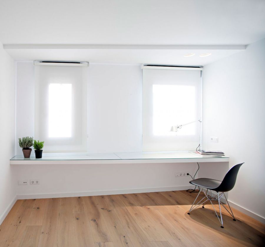 Brilliant Spanish Duplex Employs Inventive Floor Plan And