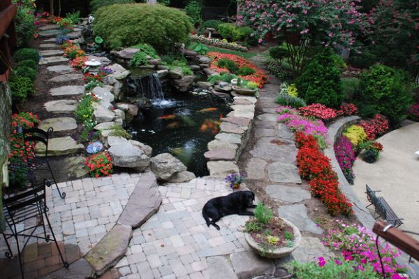 Rock patio with a koi pond at its heart