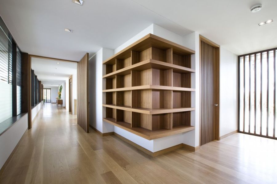 Sleek wooden shelves at the Albatross Project home