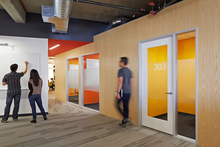 Orange and yellow rooms with more wood grain walls