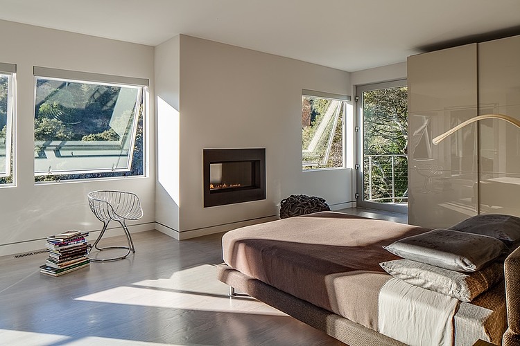 Stylish bedroom with a fireplace