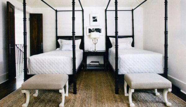 Twin four-poster beds with Ajax Ottomans