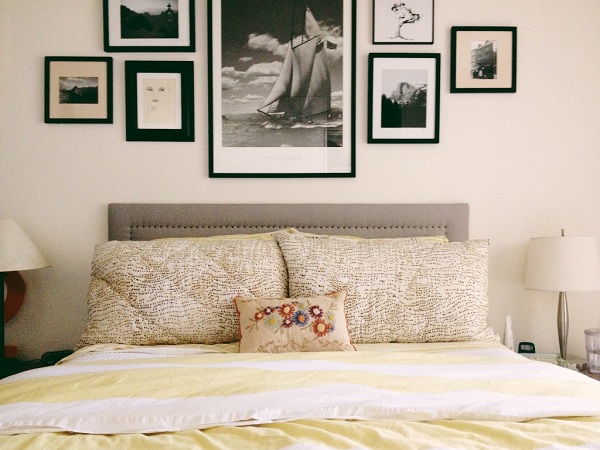 Upholstered headboard with carpet tacks