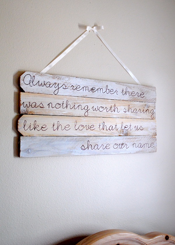 Wall art recycled from fence posts