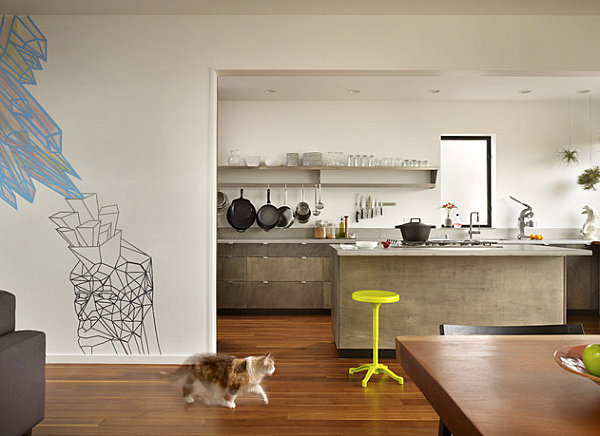 Wall mural and neon stool in an otherwise neutral interior