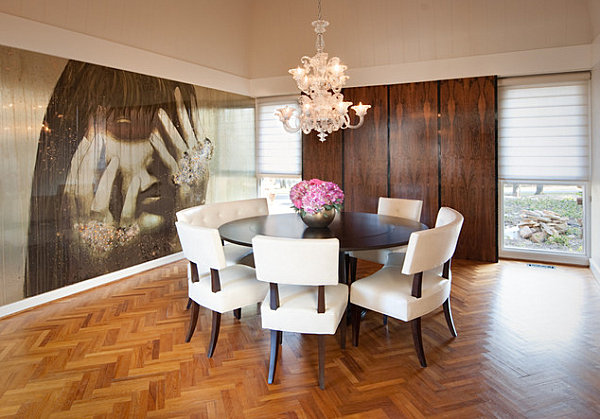 Wall of art panels in a modern dining room