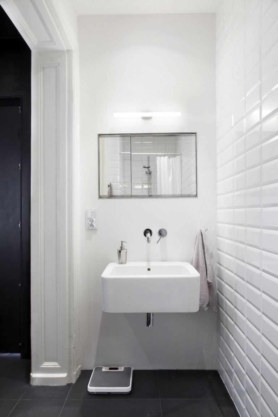 White furnishings in minimalist bathroom