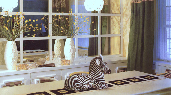 Zebra centerpiece in a dining room designed by Jonathan Adler