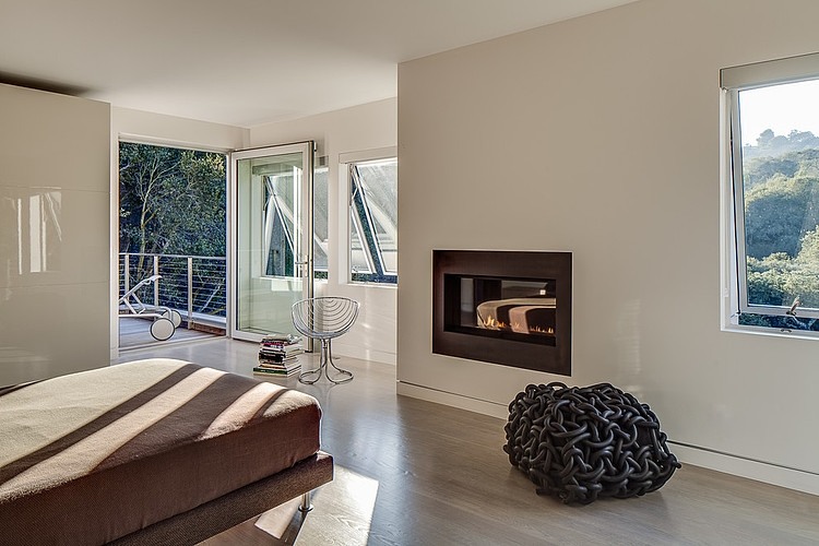 bedroom with a view of the woods