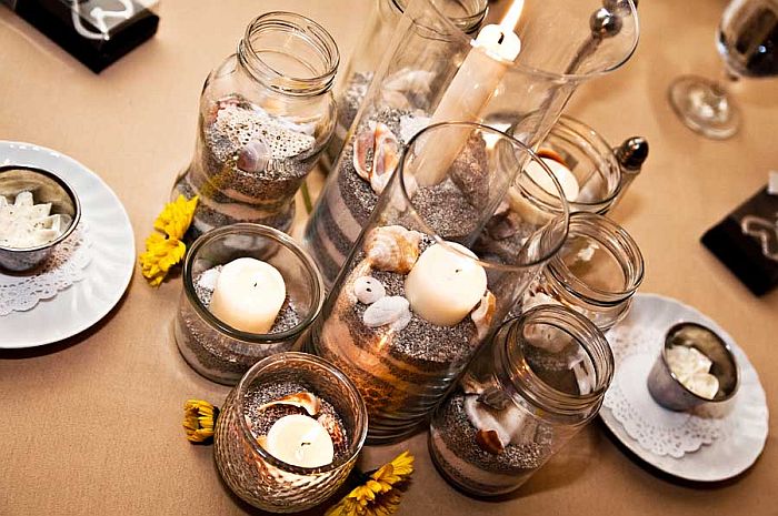 candle and sand vase arrangement