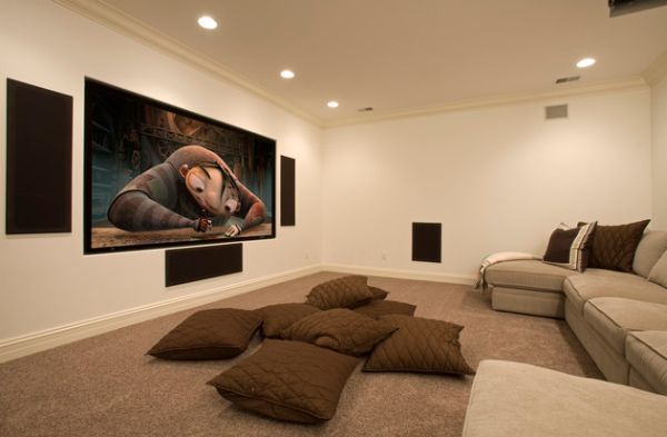 A bunch of floor pillows brings a plush and comfortable appeal to the home theater