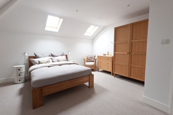 Attic bedroom with Componibili unit as bed side table