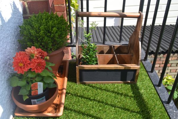 Balcony garden with artificial grass