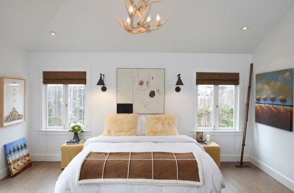 Beautiful chandelier gives the bedroom a natural look