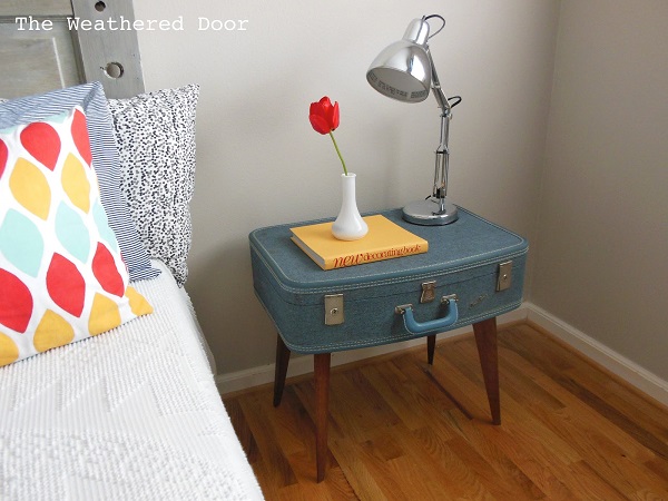 Blue vintage suitcase nightstand